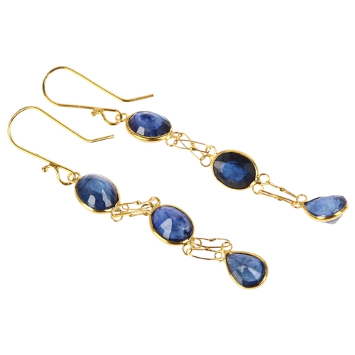 1217 - A pair of 14ct gold sapphire drop earrings, rub-over set with oval mixed-cut sapphires and shepherd ... 