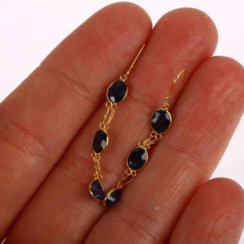 1217 - A pair of 14ct gold sapphire drop earrings, rub-over set with oval mixed-cut sapphires and shepherd ... 