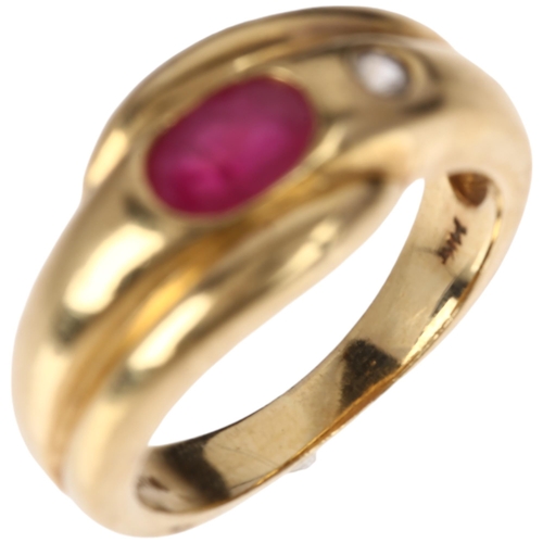 1229 - A 14ct gold ruby and white sapphire crossover ring, maker WHS, rub-over set with oval mixed-cut ruby... 