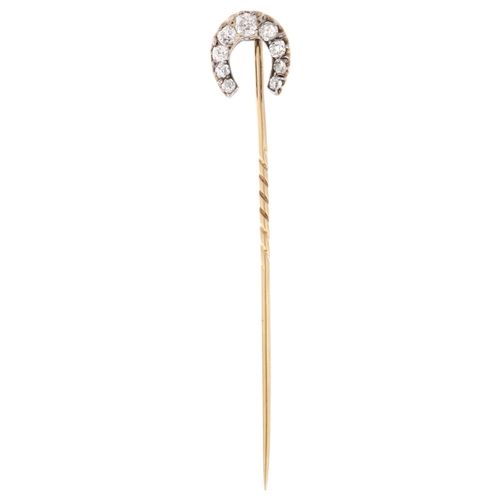 1231 - A 19th century diamond horseshoe stickpin, claw set with old-cut diamonds, total diamond content app... 