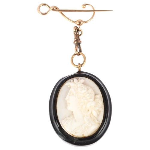 1236 - A 19th century coral cameo brooch, on Art Nouveau 9ct gold Murrle Bennett brooch fitting, panel reli... 