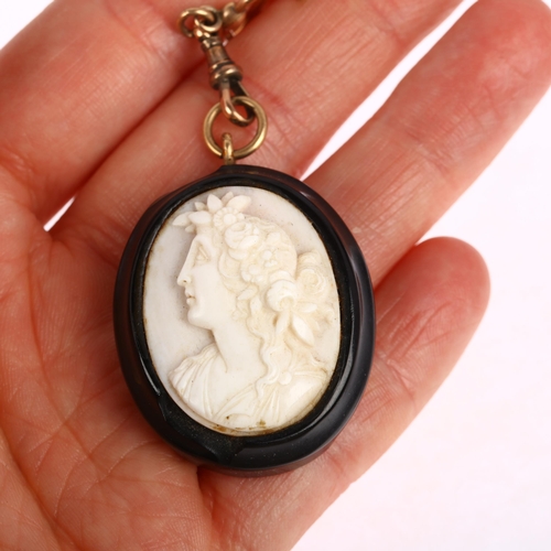 1236 - A 19th century coral cameo brooch, on Art Nouveau 9ct gold Murrle Bennett brooch fitting, panel reli... 