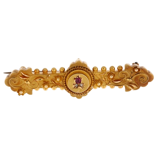 1237 - A Victorian 15ct gold ruby and diamond Etruscan Revival brooch, circa 1890, central floral motif wit... 