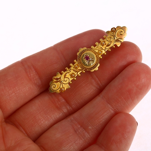 1237 - A Victorian 15ct gold ruby and diamond Etruscan Revival brooch, circa 1890, central floral motif wit... 