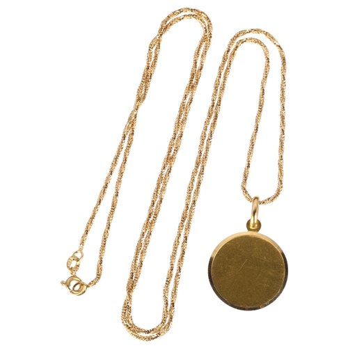 1242 - An Italian 18ct gold disc pendant necklace, on 18ct twisted foxtail link chain, pendant diameter 22m... 