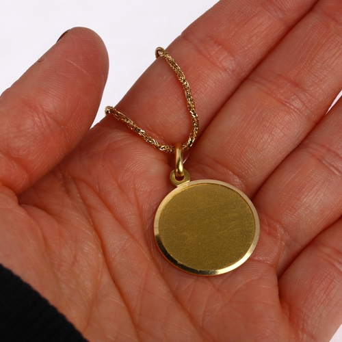 1242 - An Italian 18ct gold disc pendant necklace, on 18ct twisted foxtail link chain, pendant diameter 22m... 