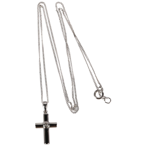 1256 - A modern 9ct white gold diamond cross pendant necklace, set with 0.02ct modern round brilliant-cut d... 