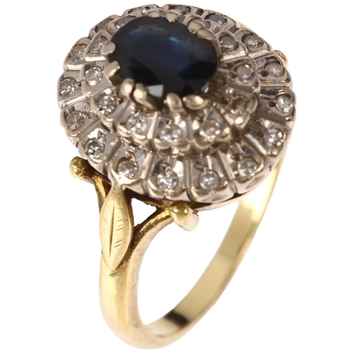 1260 - A late 20th century 18ct gold sapphire and diamond oval cluster ring, claw set with oval mixed-cut s... 