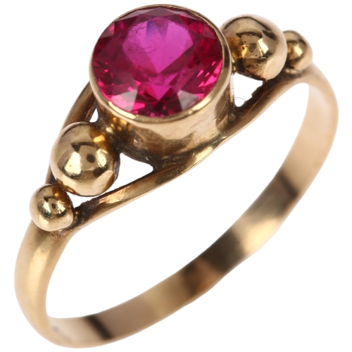 1273 - A late 20th century Middle Eastern synthetic ruby ring, apparently unmarked, setting height 7.1mm, s... 