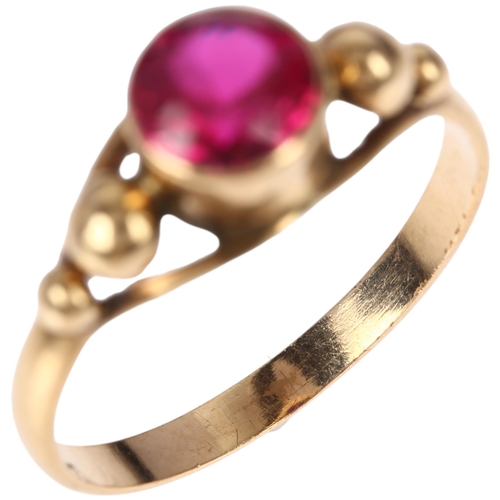 1273 - A late 20th century Middle Eastern synthetic ruby ring, apparently unmarked, setting height 7.1mm, s... 