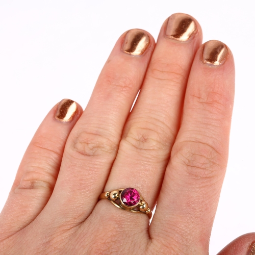 1273 - A late 20th century Middle Eastern synthetic ruby ring, apparently unmarked, setting height 7.1mm, s... 