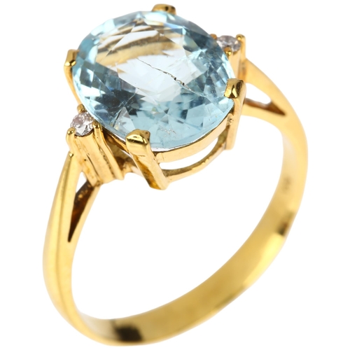 1275 - A 14ct gold three stone aquamarine and diamond ring, claw set with 3.6ct oval mixed-cut aquamarine a... 