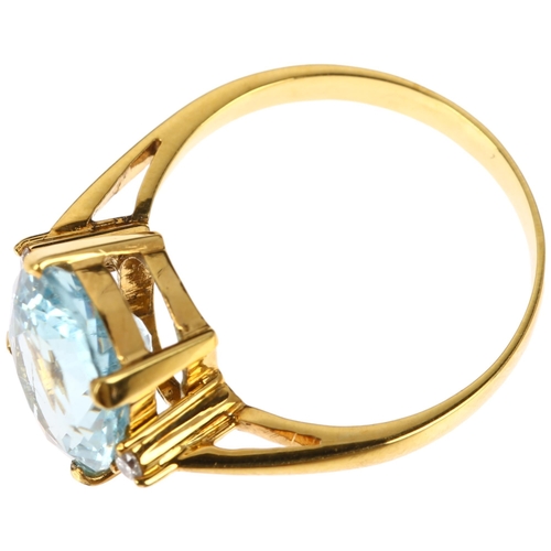 1275 - A 14ct gold three stone aquamarine and diamond ring, claw set with 3.6ct oval mixed-cut aquamarine a... 