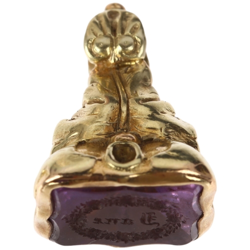 1277 - A 19th century amethyst 'Jane' seal fob, intaglio carved with name within laurel wreath, unmarked ye... 