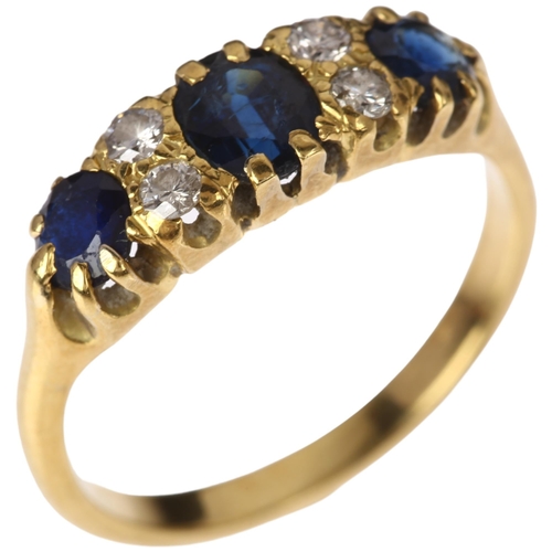 1285 - An early 20th century 18ct gold seven stone sapphire and diamond half hoop ring, set with oval and r... 