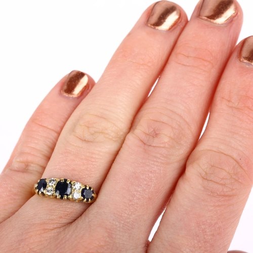 1285 - An early 20th century 18ct gold seven stone sapphire and diamond half hoop ring, set with oval and r... 