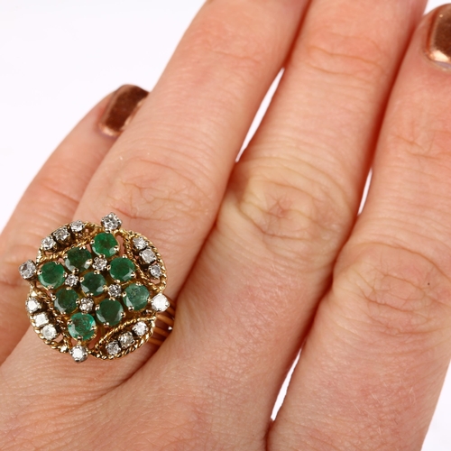 1290 - A Continental emerald and diamond cluster compass cocktail ring, claw set with round-cut emeralds, s... 