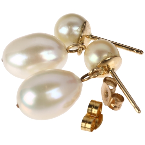 1297 - A pair of cultured pearl drop earrings, unmarked yellow metal stud fittings, 21.5mm, 3.4g