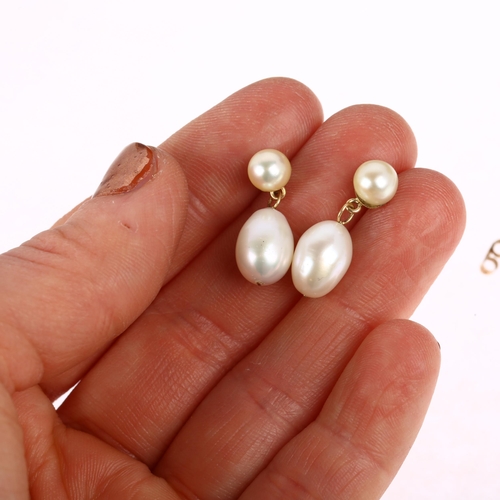 1297 - A pair of cultured pearl drop earrings, unmarked yellow metal stud fittings, 21.5mm, 3.4g