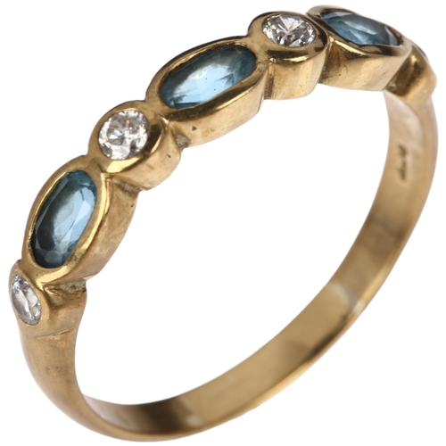 1299 - A modern 9ct gold blue topaz and diamond half eternity ring, setting height 4.45mm, size V, 3.2g