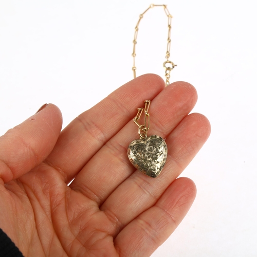 1301 - An Antique heart locket pendant necklace, on 15ct bar link chain, pendant apparently unmarked, 22.5m... 