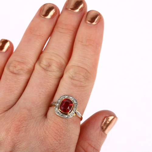 1302 - A French 18ct gold late 20th century garnet-topped-doublet diamond cluster ring, rub-over set with o... 