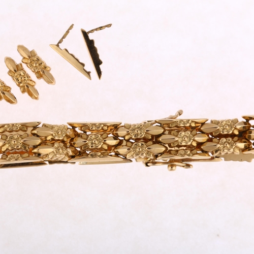 1307 - An 18ct gold floral panel bracelet, 17cm, with 2 spare links, 15.9g total