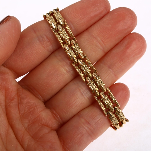 1307 - An 18ct gold floral panel bracelet, 17cm, with 2 spare links, 15.9g total