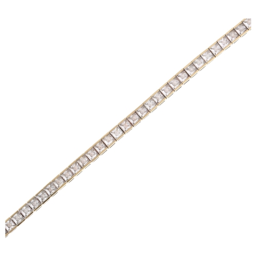 1312 - A modern 9ct gold cubic zirconia tennis line bracelet, 19cm, 9.8g