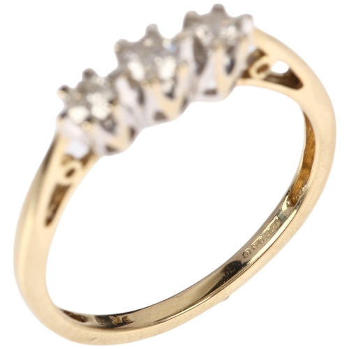 1315 - A modern 9ct gold three stone diamond ring, maker FH Ltd, claw set with modern round brilliant-cut d... 