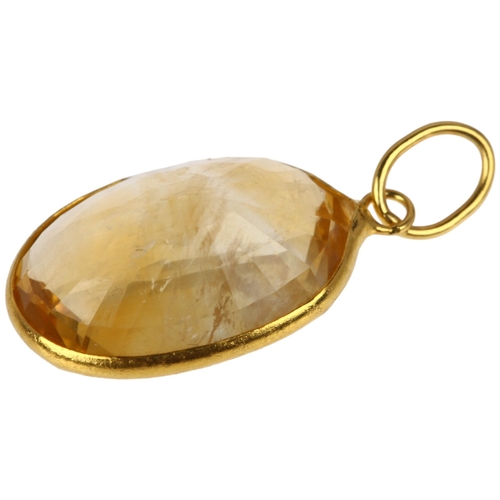 1325 - A modern 14ct gold citrine drop pendant, rub-over set with oval mixed-cut citrine, 21.7mm, 1.2g