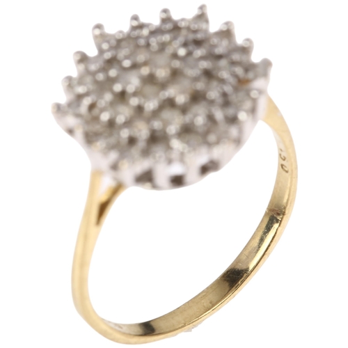 1340 - A modern 9ct gold diamond hexagonal cluster ring, claw set with modern round brilliant-cut diamonds,... 