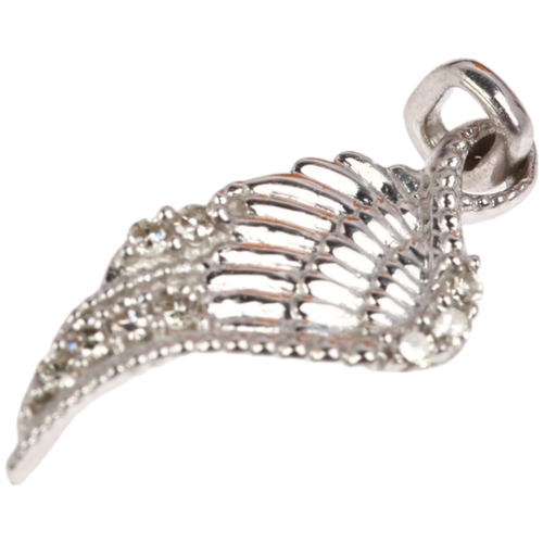 1348 - A modern 9ct white gold diamond angel wing pendant, set with single-cut diamonds, total diamond cont... 