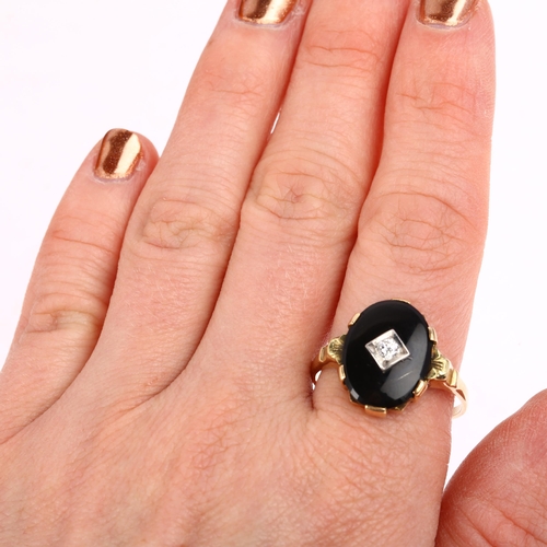 1356 - An American onyx and diamond dress ring, set with 0.1ct modern round brilliant-cut diamond, apparent... 