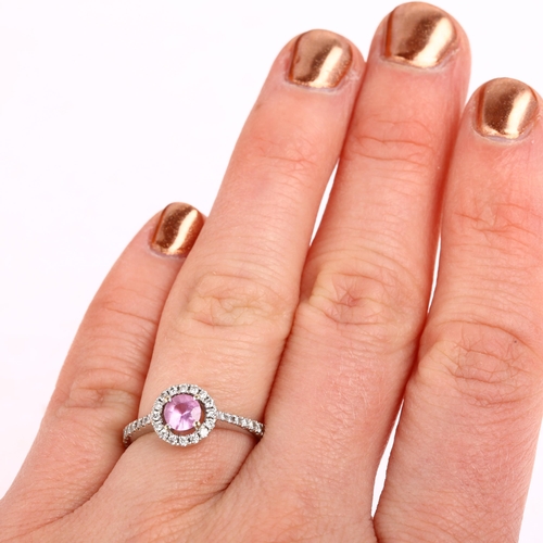 1361 - A modern 18ct white gold pink sapphire and diamond halo cluster ring, by The Diamond Store of London... 