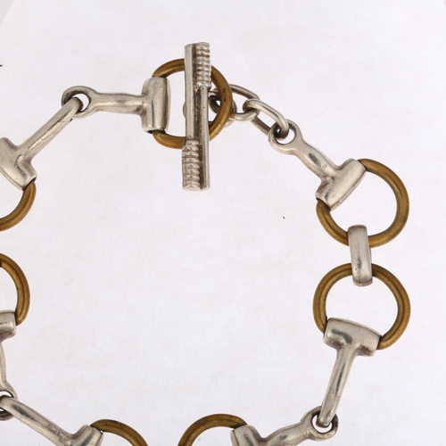 1384 - A Mexican sterling silver and brass horse snaffle link bracelet, 20cm, 28.4g