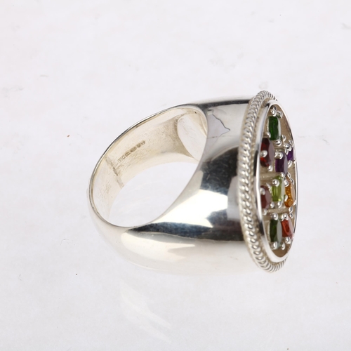 1388 - A large sterling silver gem set dress ring, gemstones include peridot amethyst citrine and garnet, s... 