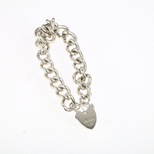 1393 - A heavy late 20th century silver solid curb link chain bracelet, maker CB Ltd, Birmingham 1978, with... 