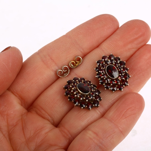 1398 - A pair of Bohemian garnet oval cluster earrings, unmarked silver-gilt settings with stud fittings, 1... 