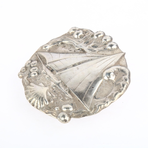 1400 - HC OSTREM A/S - a large Norwegian silver sailing yacht brooch, maker's mark OXO, relief embossed dec... 