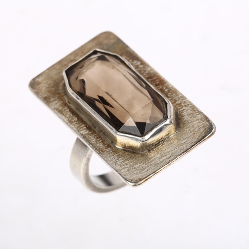 1406 - A late 20th century smoky quartz panel ring, circa 1970s, unmarked silver naturalistic bark settings... 