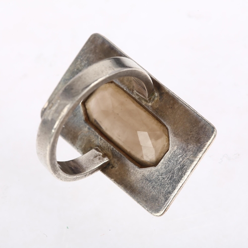 1406 - A late 20th century smoky quartz panel ring, circa 1970s, unmarked silver naturalistic bark settings... 