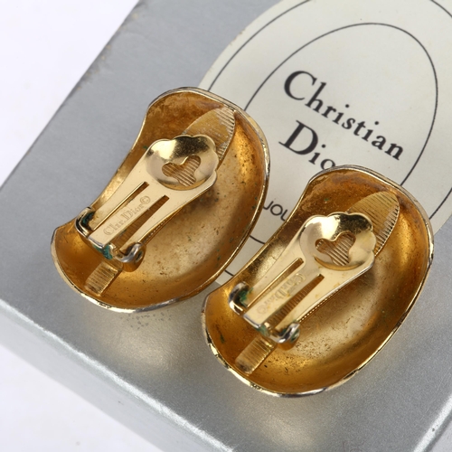 1407 - CHRISTIAN DIOR - a pair of Vintage gold plated domed half hoop clip-on earrings, signed, 30mm, 14.9g... 