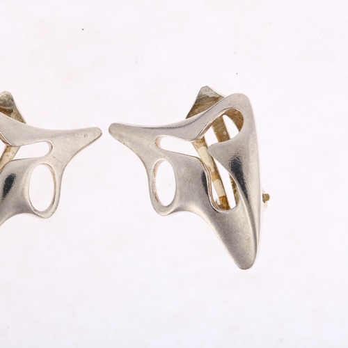 1412 - GEORG JENSEN - a pair of Danish modernist sterling silver abstract clip-on earrings, designed by Hen... 