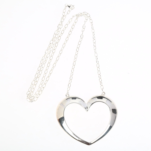 1434 - BERNHARD HERTZ - a large Danish modernist sterling silver heart openwork pendant necklace, on integr... 