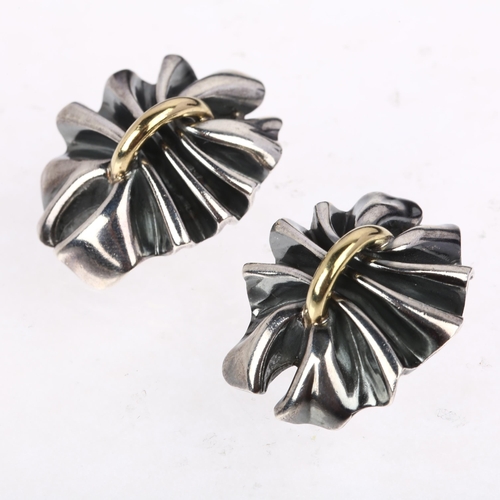 1435 - GEORG JENSEN - a heavy pair of Danish modernist sterling silver and silver-gilt fold clip-on earring... 