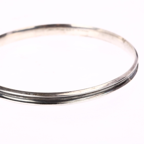 1442 - HANS HANSEN -a Danish modernist oxidised sterling silver slave bangle, circa 1960s, band width 6mm, ... 