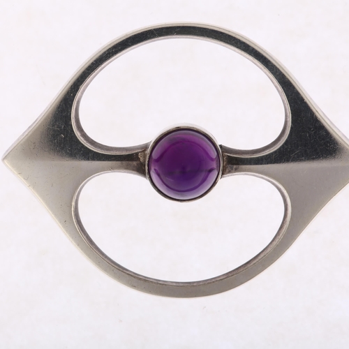 1457 - HANS HANSEN - a Danish modernist sterling silver amethyst openwork eye brooch, 46.5mm, 13.3g