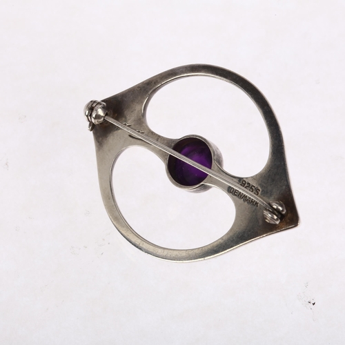 1457 - HANS HANSEN - a Danish modernist sterling silver amethyst openwork eye brooch, 46.5mm, 13.3g