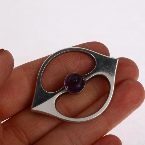 1457 - HANS HANSEN - a Danish modernist sterling silver amethyst openwork eye brooch, 46.5mm, 13.3g